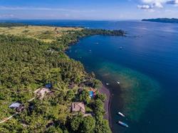 Dive Centre Lembeh at Hairball Resort - aerial view shore house reef.